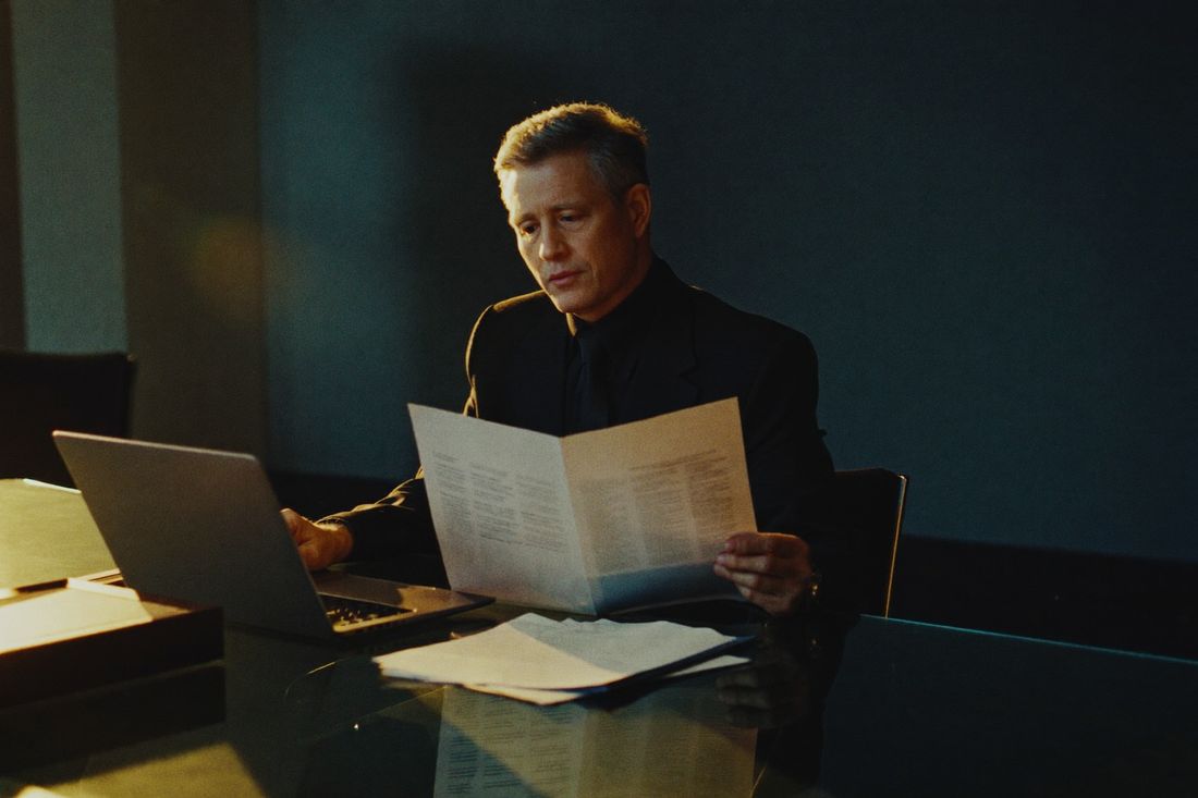 An operations leader reviewing weekly performance reports